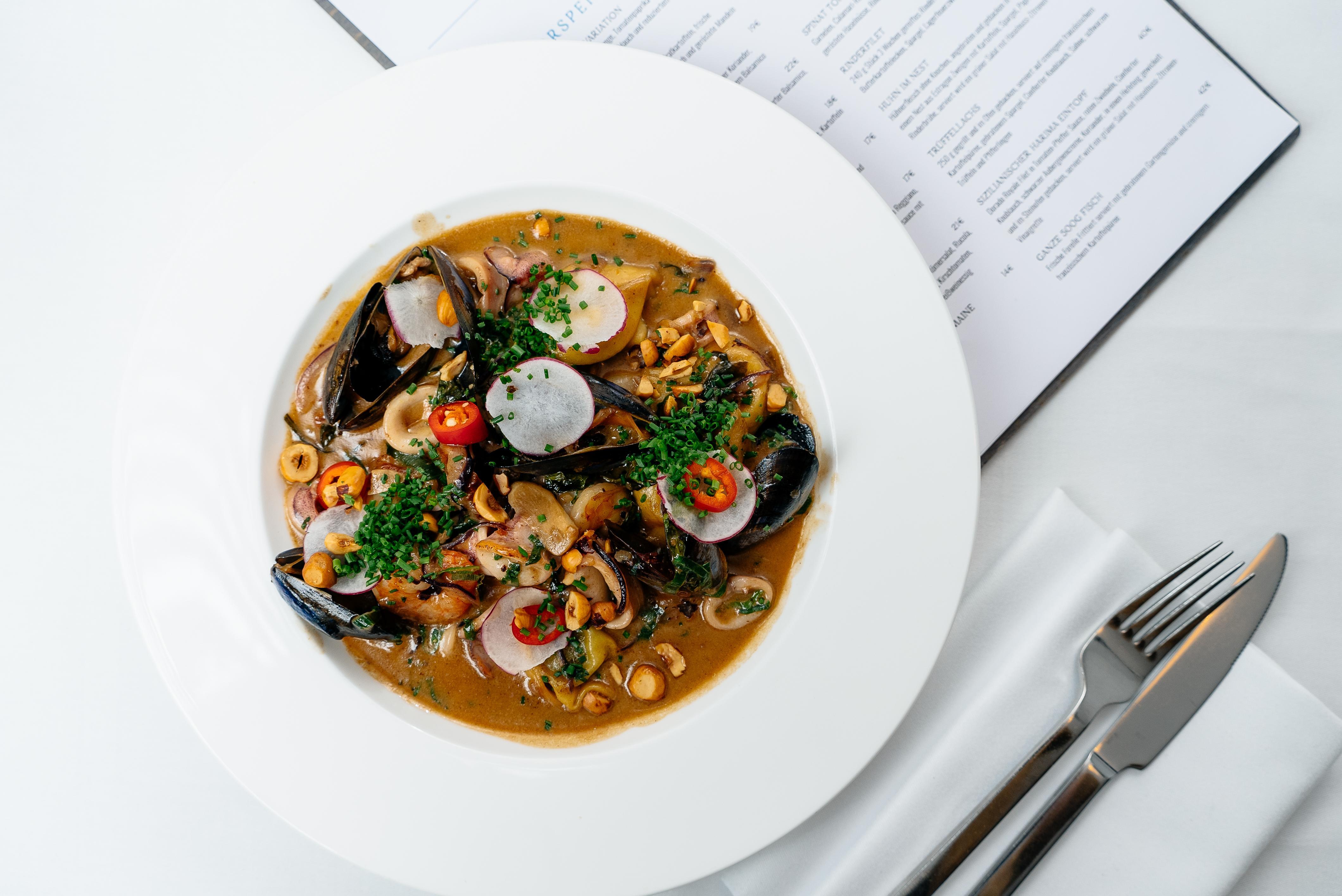 Precise Resort Bad Saarow Esterno foto A plate of seafood chowder